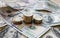 Dollar bills laid out on the table. Three different columns of coins, financial crisis, money, savings, salary, bank