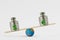 Dollar and euro symbols on balance scale - Concept of dollar dominance over euro in global markets