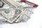 Dollar money with Shopping Cart On White Background Shot In Stud