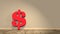 Dollar sign in red colour on wooden floor leaned against the wall