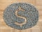 Dollar symbol made of hemp seeds