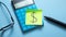 Dollar symbol on the sticky note. Business. Finance