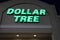 Dollar Tree retail store exterior illuminated sign at night