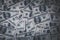 Dollars background, heap of hundred USA dollar banknote bills, many American cash money, top view