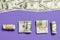 Dollars currency on colored background top view, with empty place for your text business money concept. One hundred dollar bills