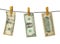 Dollars hang on clothes-peg