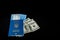 Dollars, Passport and air tickets on a black background. mockup empty blank, copy space