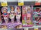 Dolls in packages in a supermarket for sale