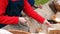 Dolly parallax shot of woman puts onion on fresh organic bread