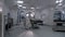 Dolly shot of modern operating room with advanced equipment for surgery