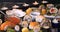 Dolly view of an assortment of Japanese food: sushi, nigiri, sashimi