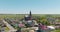 dolly zoom effect and aerial view on old neo gothic temple or catholic church in countryside
