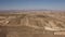 Dolly zoom over huge windmill farm