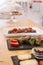 Dolma, delicious Casucasian and Turkish cuisine, vine leaves stuffed with minced meat and rice and italian bruschetta with cherry