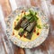 Dolma in grape leaves with lamb on mushroom julienne. Haute cuisine. On a wooden background