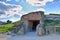 Dolmen de Menga - exterior of megalithic burial tumulus. One of the largest known ancient megalithic structures in Europe