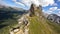 The Dolomites mountain range Italy part of the Southern Limestone Alps. First person view mountain aerial Hiking