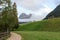 Dolomites mountain Sextner Rotwand with clouds and footpath in South Tyrol