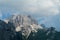 Dolomites rocky tower mountains the Alps with dark clouds