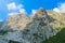 Dolomites rocky tower mountains the Alps with dark clouds