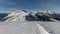 Dolomites, ski area with beautiful slopes. Empty ski slope in winter on a sunny day. Prepare ski slope, Alpe di Lusia, Italy