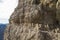 Dolomites via ferrata on rocky mountain wall in the Alpes