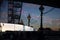 Dolphin lamp posts and London Eye reflecting in a kiosk window o