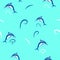 Dolphin stylized Vector seamless pattern on blue background