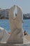 Dolphins statue monument at waterfront promenade in Saranda , Albania