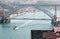 Dom Luis bridge and a ship in Porto on a sunny day