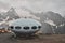 Dombay, Russia - June 09, 2022: hotel is in the form of a flying saucer on the mountain, flying saucer in the mountains, UFO in