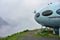 Dombay, Russia - June 09, 2022: hotel is in the form of a flying saucer on the mountain, flying saucer in the mountains, UFO in