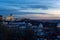 The dome of the Almuneda cathedral and the royal palace in Madrid seen from campo del Moro