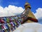 The dome of the Boudhanath Stupa with prayer flags, Kathmandu, Nepal