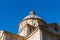 The dome of Chiesa di San Biagio, a small Renaissance church in it Montepulciano against the blue sky, Tuscany, Italy