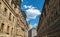 Dome of the Frauenkirche seen between walls with beautiful historic paintings in Dresden, Germany