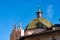 Dome with green and yellow majolica roof tiles - Trento Italy