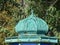 The dome on the old gazebo. The dome-onion has a convex shape, smoothly pointed at the top, similar to the onion.