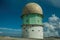 Dome of old radar station on rocky landscape