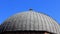 Dome of old Turkish baths with blue sky