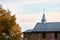 Dome with orthodox cross and ancient thousand years brick masonry wall of St Boris and Gleb or Kalozhskaya Church in