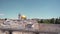 Dome of the Rock as viewed from the Mount of Olives in Jerusalem. Slow motion reveal panning shot at Jerusalem Old city