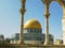 Dome of the rock framed by several arches in jerusalem