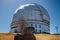 Dome of special astrophysical observatory on blue sky background at sunny day