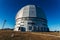 Dome of special astrophysical observatory on blue sky background at sunny day