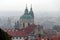 Dome of St. Nicolas church on a foggy day