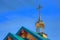 The dome of a temple with a cross on the roof. Orthodox Church