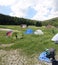 Dome tents in the mountains during a campsite of boyscouts