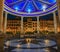 Domed gazebo illuminated at night, Historic Plaza del Castillo in Pamplona Spain