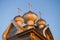 Domes of the ancient wooden church of Dmitry the Theunal Myrrh-streaming